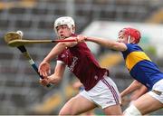 19 June 2022; Rory Burke of Galway in action against Aaron O'Halloran of Tipperary during the Electric Ireland GAA Hurling All-Ireland Minor Championship Semi-Final match between Tipperary and Galway at the LIT Gaelic Grounds in Limerick. Photo by Michael P Ryan/Sportsfile