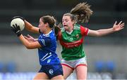 19 June 2022; Neasa Byrd of Cavan in action against Sinead Walsh of Mayo during the TG4 All-Ireland SFC Group A Round 2 match between Cavan and Mayo at Glennon Brothers Pearse Park in Longford. Photo by Ben McShane/Sportsfile