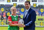 19 June 2022; Lisa Cafferky of Mayo receives the Player of the Match award from LGFA President Mícheál Naughton after the TG4 All-Ireland SFC Group A Round 2 match between Cavan and Mayo at Glennon Brothers Pearse Park in Longford. Photo by Ben McShane/Sportsfile