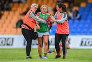 19 June 2022; Eilis Ronayne of Mayo is assisted from the pitch after picking up an injury during the TG4 All-Ireland SFC Group A Round 2 match between Cavan and Mayo at Glennon Brothers Pearse Park in Longford. Photo by Ben McShane/Sportsfile