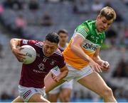 19 June 2022; Ronan O'Toole of Westmeath is tackled by Johnny Moloney of Offaly during the Tailteann Cup Semi-Final match between Westmeath and Offaly at Croke Park in Dublin. Photo by Ray McManus/Sportsfile