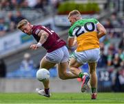 19 June 2022; Luke Loughlin of Westmeath in action against David Dempsey of Offaly during the Tailteann Cup Semi-Final match between Westmeath and Offaly at Croke Park in Dublin. Photo by Ray McManus/Sportsfile