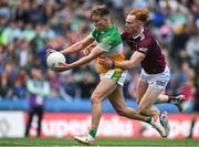 19 June 2022; Keith O'Neill of Offaly being tackled Ronan Wallace of Westmeath as he is on his way to scoring his side's first goal during the Tailteann Cup Semi-Final match between Westmeath and Offaly at Croke Park in Dublin. Photo by George Tewkesbury/Sportsfile