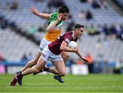 19 June 2022; Sam Duncan of Westmeath in action against Bill Carroll of Offaly during the Tailteann Cup Semi-Final match between Westmeath and Offaly at Croke Park in Dublin. Photo by Ray McManus/Sportsfile