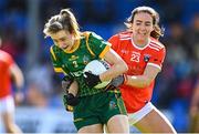 19 June 2022; Mary Kate Lynch of Meath in action against Tiarna Grimes of Armagh during the TG4 All-Ireland SFC Group B Round 2 match between Armagh and Meath at Glennon Brothers Pearse Park in Longford. Photo by Ben McShane/Sportsfile