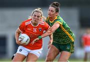19 June 2022; Kelly Mallon of Armagh is tackled by Máire O'Shaughnessy of Meath during the TG4 All-Ireland SFC Group B Round 2 match between Armagh and Meath at Glennon Brothers Pearse Park in Longford. Photo by Ben McShane/Sportsfile