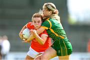 19 June 2022; Niamh Marley of Armagh is tackled by Orlagh Lally of Meath during the TG4 All-Ireland SFC Group B Round 2 match between Armagh and Meath at Glennon Brothers Pearse Park in Longford. Photo by Ben McShane/Sportsfile