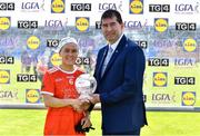 19 June 2022; Lauren McConville of Armagh receives the Player of the Match award from LGFA President Mícheál Naughton after the TG4 All-Ireland SFC Group B Round 2 match between Armagh and Meath at Glennon Brothers Pearse Park in Longford. Photo by Ben McShane/Sportsfile
