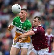 19 June 2022; Dylan Hyland of Offaly is tackled by Jamie Gonoud of Westmeath during the Tailteann Cup Semi-Final match between Westmeath and Offaly at Croke Park in Dublin. Photo by Ray McManus/Sportsfile