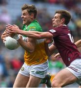 19 June 2022; Johnny Moloney of Offaly in action against John Heslin of Westmeath during the Tailteann Cup Semi-Final match between Westmeath and Offaly at Croke Park in Dublin. Photo by George Tewkesbury/Sportsfile