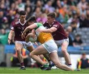 19 June 2022; James Lalor of Offaly in action against Ronan O'Toole, left, and Nigel Harte of Westmeath during the Tailteann Cup Semi-Final match between Westmeath and Offaly at Croke Park in Dublin. Photo by George Tewkesbury/Sportsfile