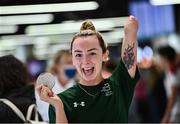 19 June 2022; Ellen Keane with her silver medal as she arrived home from the IPC Para Swimming World Championships 2022 at Dublin Airport in Dublin. Photo by David Fitzgerald/Sportsfile