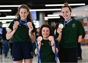 19 June 2022; Medallists, from left, Róisín Ní Ríain with two bronze medals, Nicole Turner with two bronze medals and Ellen Keane with a silver medal as they arrived home from the IPC Para Swimming World Championships 2022 at Dublin Airport in Dublin. Photo by David Fitzgerald/Sportsfile