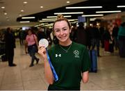 19 June 2022; Ellen Keane with her silver medal as she arrived home from the IPC Para Swimming World Championships 2022 at Dublin Airport in Dublin. Photo by David Fitzgerald/Sportsfile