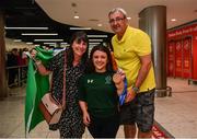 19 June 2022; Nicole Turner with her parents Jason and Bernie and her two bronze medals as she arrived home from the IPC Para Swimming World Championships 2022 at Dublin Airport in Dublin. Photo by David Fitzgerald/Sportsfile