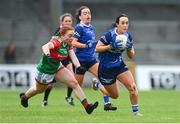 19 June 2022; Geraldine Sheridan of Cavan and Nina McVann of Mayo during the TG4 All-Ireland SFC Group A Round 2 match between Cavan and Mayo at Glennon Brothers Pearse Park in Longford. Photo by Ben McShane/Sportsfile