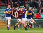 19 June 2022; Luke McInerney of Galway in action against Conor Martin of Tipperary during the Electric Ireland GAA Hurling All-Ireland Minor Championship Semi-Final match between Tipperary and Galway at the LIT Gaelic Grounds in Limerick. Photo by Michael P Ryan/Sportsfile