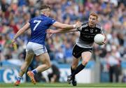 19 June 2022; Aeán Carrabine of Sligo in action against Conor Brady of Cavan during the Tailteann Cup Semi-Final match between Westmeath and Offaly at Croke Park in Dublin. Photo by George Tewkesbury/Sportsfile