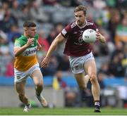 19 June 2022; Kevin Maguire of Westmeath in action against Cathal Flynn of Offaly during the Tailteann Cup Semi-Final match between Westmeath and Offaly at Croke Park in Dublin. Photo by George Tewkesbury/Sportsfile