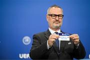 21 June 2022; UEFA Chief of Men's Football & Deputy Director Lance Kelly draws out the card of Republic of Ireland during the UEFA European Under-21 Championship 2023 Play-offs draw at the UEFA headquarters, The House of European Football, in Nyon, Switzerland. Photo by Kristian Skeie - UEFA/UEFA via Sportsfile