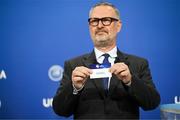 21 June 2022; UEFA Chief of Men's Football & Deputy Director Lance Kelly draws out the card of Israel during the UEFA European Under-21 Championship 2023 Play-offs draw at the UEFA headquarters, The House of European Football, in Nyon, Switzerland. Photo by Kristian Skeie - UEFA/UEFA via Sportsfile