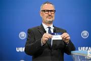 21 June 2022; UEFA Chief of Men's Football & Deputy Director Lance Kelly draws out the card of Israel during the UEFA European Under-21 Championship 2023 Play-offs draw at the UEFA headquarters, The House of European Football, in Nyon, Switzerland. Photo by Kristian Skeie - UEFA/UEFA via Sportsfile
