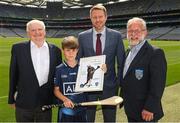 23 June 2022; Alan Black, Customer Relationship Manager - Religious & Education at Allianz, centre, Tadhg Kenny, Uachtarán Cumann na mBunscol, left, and Jerry Grogan, PRO, Cumann na mBunscol with Jason McGovern, Holy Trinity, Donaghmede, at the Allianz Cumann na mBunscol captain presentations in Croke Park, Dublin. Photo by Ray McManus/Sportsfile