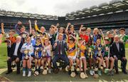 23 June 2022; Alan Black, Customer Relationship Manager - Religious & Education at Allianz, centre, Tadhg Kenny, Uachtarán Cumann na mBunscol, left, and Jerry Grogan, PRO, Cumann na mBunscol, right, with with winning captains Aoibhinn O'Farrell, Scoil Thomáis, Ava Grace O'Riordan, Scoil Thomáis, Annie McCauley, Loretto Grange Road, Úna ó Bréartúin, Gaelscoil Chnoc Liamhna, Caoimhe Phelan, St Olaf's N.S., Mia Coleman, Gaelscoil Inse Chór, Amy Nic Gabhann, Scoil Mológa, Béibhinn O'Donnell, Loretto PS, Dalkey, Cara Keane, Holly Park GNS, Eadaoin McClean, Holly Park GNS, Tom O'Halloran, Scoil Lorcán Naofa, Joseph Davy, Scoil Lorcán Naofa, Matthew Molloy, St Cronan's, Brackenstown, Richard McCann, Griffith Barracks NS, Harry Mac Eoghain, Scoil Naithí, Peter Nurray, Scoil Bhríde, Ronan Feerick, St Bridid's Killester, Luke Coughlan, at the Allianz Cumann na mBunscol captain presentations in Croke Park, Dublin. Photo by Ray McManus/Sportsfile