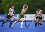 23 June 2022; Michelle Carey of Ireland in action against Shiho Kobayakawa, left, and Natsuha Matsumoto of Japan during the SoftCo Series match beetween Ireland and Japan at National Hockey Stadium in UCD, Dublin. Photo by David Fitzgerald/Sportsfile