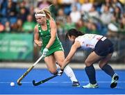 23 June 2022; Caoimhe Perdue of Ireland in action against Kana Urata of Japan during the SoftCo Series match between Ireland and Japan at National Hockey Stadium in UCD, Dublin. Photo by David Fitzgerald/Sportsfile