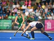 23 June 2022; Caoimhe Perdue of Ireland in action against Kana Urata of Japan during the SoftCo Series match between Ireland and Japan at National Hockey Stadium in UCD, Dublin. Photo by David Fitzgerald/Sportsfile