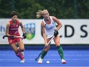 22 June 2022; Sarah Hawkshaw of Ireland in action against Kaho Tanaka of Japan during the SoftCo Series International Hockey match between Ireland and Japan at the National Hockey Stadium in UCD, Dublin. Photo by George Tewkesbury/Sportsfile