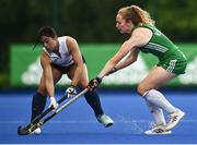23 June 2022; Kana Urata of Japan in action against Michelle Carey of Ireland during the SoftCo Series match between Ireland and Japan at National Hockey Stadium in UCD, Dublin. Photo by David Fitzgerald/Sportsfile