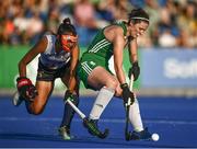 23 June 2022; Róisín Upton of Ireland in action against Yuu Asai of Japan during the SoftCo Series match between Ireland and Japan at National Hockey Stadium in UCD, Dublin. Photo by David Fitzgerald/Sportsfile