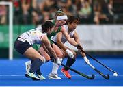 23 June 2022; Naomi Carroll of Ireland in action against Kana Urata, left, and Moeka Tsubouchi of Japan during the SoftCo Series match between Ireland and Japan at National Hockey Stadium in UCD, Dublin. Photo by David Fitzgerald/Sportsfile
