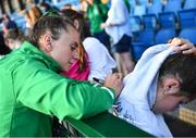 23 June 2022; Ellen Curran of Ireland signs an autograph after the SoftCo Series match between Ireland and Japan at National Hockey Stadium in UCD, Dublin. Photo by David Fitzgerald/Sportsfile