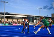 23 June 2022; Yuu Asai of Japan in action against Zara Malseed of Ireland during the SoftCo Series match between Ireland and Japan at National Hockey Stadium in UCD, Dublin. Photo by David Fitzgerald/Sportsfile