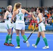 22 June 2022; Katie McKee of Ireland celebrates with team mates Charlotte Begs, left, and Zara Malseed during the SoftCo Series International Hockey match between Ireland and Japan at the National Hockey Stadium in UCD, Dublin. Photo by George Tewkesbury/Sportsfile