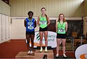 24 June 2022; The Girls 100M podium, first place, Leila Colfer of Tullow CS Carlow, centre, second place, Fatima Amusa of Bishopstown CS, left, and third place, Lucy Hannon of Newbridge College during the Irish Life Health Tailteann School’s Inter-Provincial Games at Tullamore Harriers Stadium in Tullamore. Photo by David Fitzgerald/Sportsfile