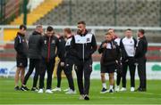 24 June 2022; Dundalk players including Robbie Benson, centre, walk the pitch before the SSE Airtricity League Premier Division match between Shelbourne and Dundalk at Tolka Park in Dublin. Photo by Michael P Ryan/Sportsfile