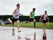 24 June 2022; Fintan Dewhirst of St Columbas Glenties, left, crosses the line to win the Boys 200M race during the Irish Life Health Tailteann School’s Inter-Provincial Games at Tullamore Harriers Stadium in Tullamore. Photo by David Fitzgerald/Sportsfile