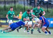 24 June 2022; Darragh McSweeney of Ireland is tackled by Maxime Baudonne of France during the Six Nations U20 summer series match between Ireland and France at Payanini Centre in Verona, Italy. Photo by Roberto Bregani/Sportsfile