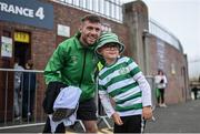 24 June 2022; Jack Byrne of Shamrock Rovers with Shamrock Rovers supporter Reily Saul, aged 8, before the SSE Airtricity League Premier Division match between Shamrock Rovers and Bohemians at Tallaght Stadium in Dublin. Photo by Ramsey Cardy/Sportsfile