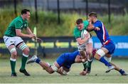 24 June 2022; Fionn Gibbons of Ireland is tackled by Noé Della Schiava of France during the Six Nations U20 summer series match between Ireland and France at Payanini Centre in Verona, Italy. Photo by Roberto Bregani/Sportsfile