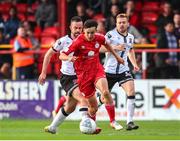 24 June 2022; Jad Hakiki of Shelbourne in action against Robbie Benson of Dundalk during the SSE Airtricity League Premier Division match between Shelbourne and Dundalk at Tolka Park in Dublin. Photo by Michael P Ryan/Sportsfile