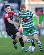 24 June 2022; Rory Gaffney of Shamrock Rovers in action against Dawson Devoy of Bohemians during the SSE Airtricity League Premier Division match between Shamrock Rovers and Bohemians at Tallaght Stadium in Dublin. Photo by Ramsey Cardy/Sportsfile