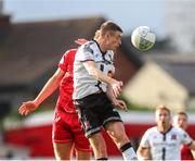 24 June 2022; Daniel Kelly of Dundalk in action against Aaron O'Driscoll of Shelbourne during the SSE Airtricity League Premier Division match between Shelbourne and Dundalk at Tolka Park in Dublin. Photo by Michael P Ryan/Sportsfile