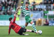 24 June 2022; Lee Grace of Shamrock Rovers is tackled by Ali Coote of Bohemians during the SSE Airtricity League Premier Division match between Shamrock Rovers and Bohemians at Tallaght Stadium in Dublin. Photo by Ramsey Cardy/Sportsfile