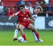 24 June 2022; Jad Hakiki of Shelbourne in action against Greg Sloggett of Dundalk during the SSE Airtricity League Premier Division match between Shelbourne and Dundalk at Tolka Park in Dublin. Photo by Michael P Ryan/Sportsfile