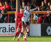 24 June 2022; Steven Bradley of Dundalk in action against Conor Kane of Shelbourne during the SSE Airtricity League Premier Division match between Shelbourne and Dundalk at Tolka Park in Dublin. Photo by Michael P Ryan/Sportsfile